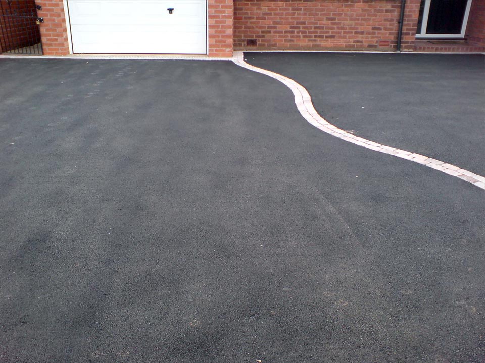 Tarmac With A Cobble Paving Edge