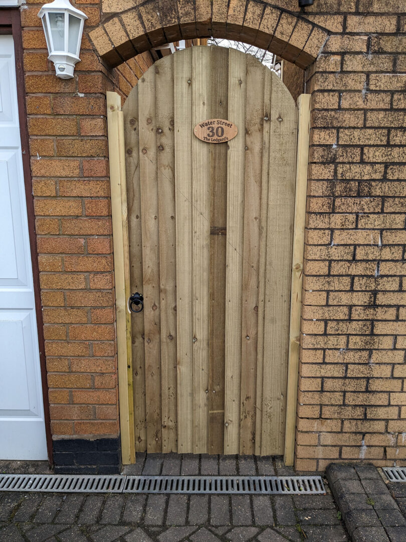 Bespoke Wooden Gate With Sign