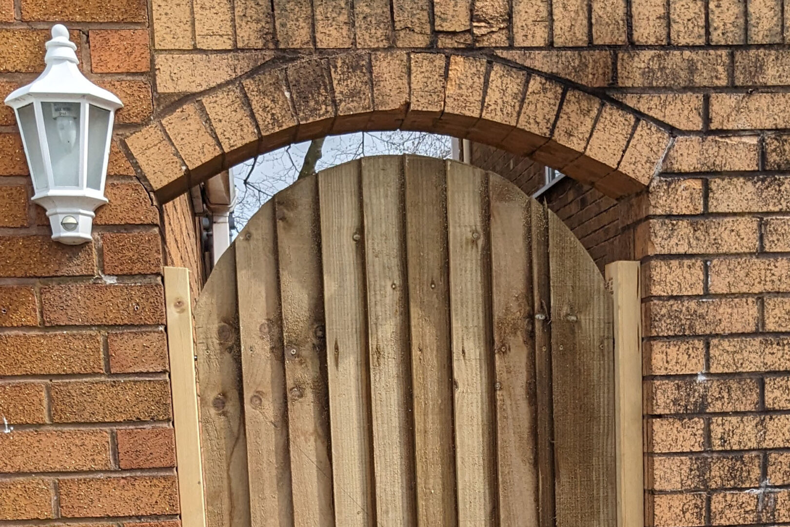 Custom Built Arched Wooden Gate